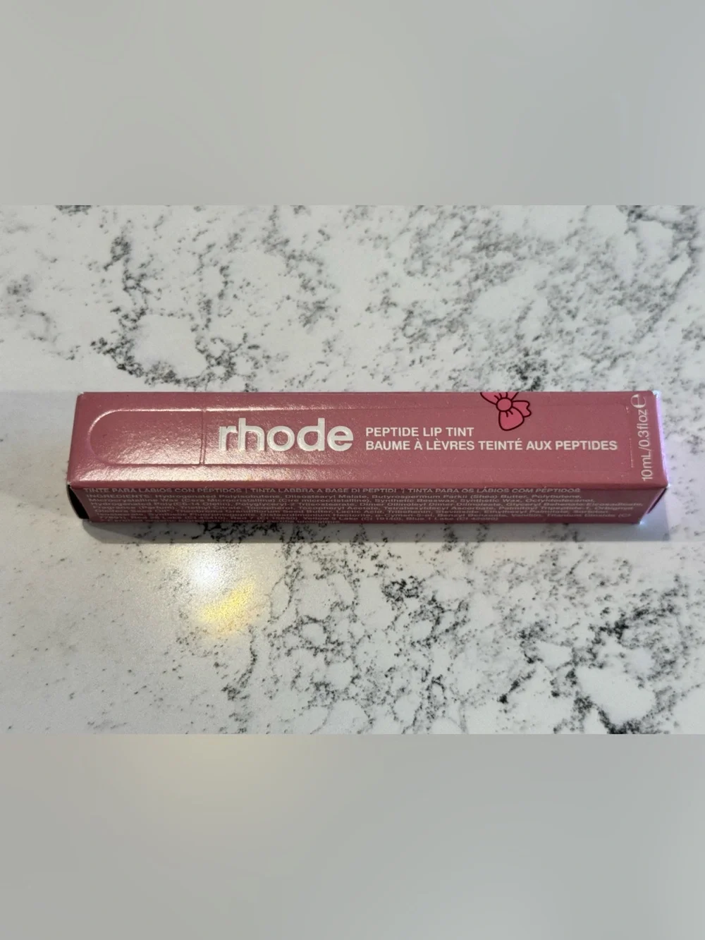 Rhode Peptide Lip Tint in “Ribbon” (Sheer Pink)
